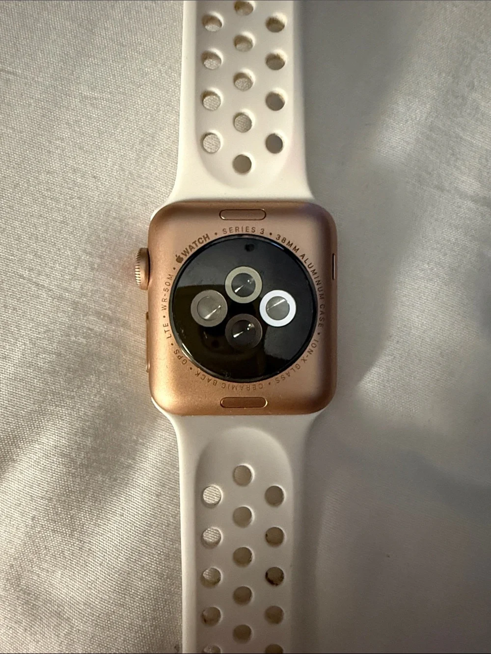 Apple Watch with White Perforated Sport Band